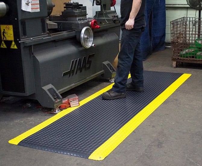 How Anti-Fatigue Floor Mats Benefit Companies and Industrial Workers   Ergonomic Flooring and Anti-fatigue Floor Mats - Surface Pros Blog by  Wearwell