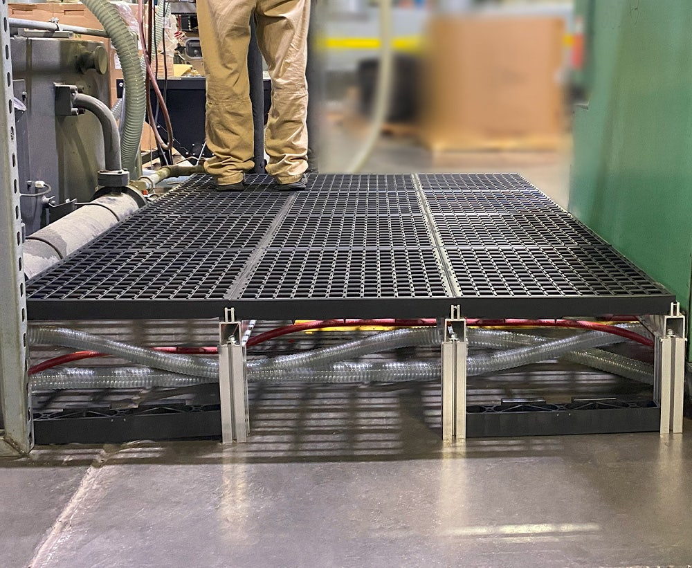 Work platforms that allow cords and hoses to go underneath 