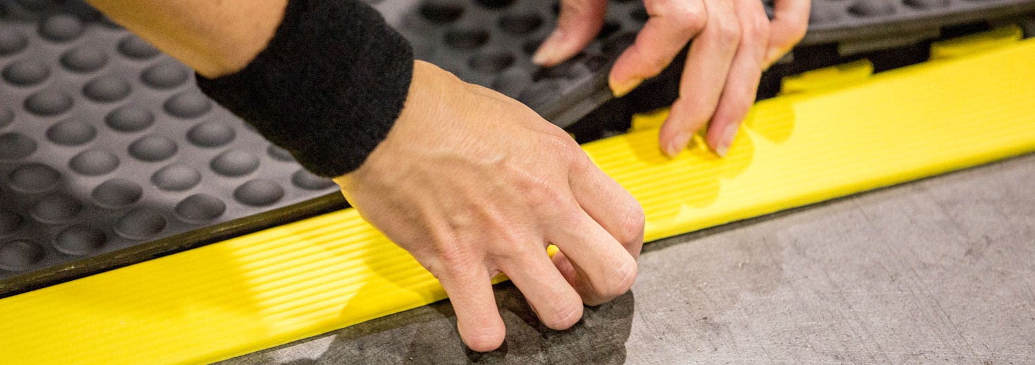 How Anti-Fatigue Floor Mats Benefit Companies and Industrial Workers   Ergonomic Flooring and Anti-fatigue Floor Mats - Surface Pros Blog by  Wearwell